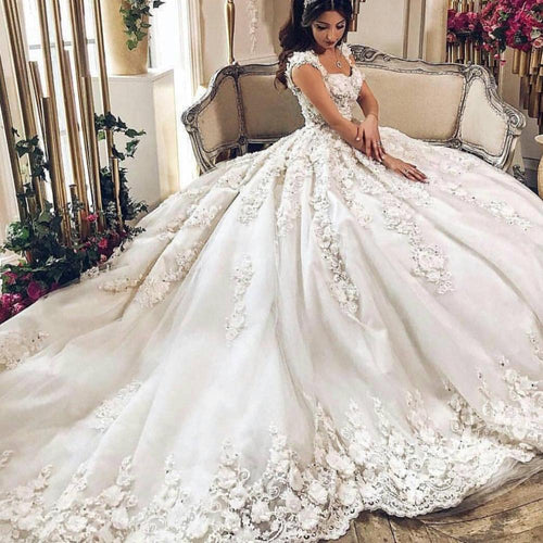 50 Gorgeous Wedding Dresses for 2022 : Oversized symmetrical 3D flower lace